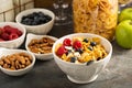 Cereal bar or buffet wih cornflakes, fruit and nuts Royalty Free Stock Photo