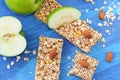 Cereal bars of granola with apples, nuts and honey Royalty Free Stock Photo