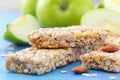 Cereal bars of granola with apples, nuts and honey Royalty Free Stock Photo