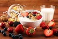 Cereal. Bowl of granola cereals, fruits and milk for breakfast. Muesli with cereals Royalty Free Stock Photo