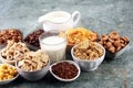 Cereal. Bowls of various cereals and milk for breakfast. Muesli with kids cereals Royalty Free Stock Photo