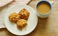 Cereal butter cookie and coffee cup on table