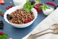 Cereal chocolate balls in bowl with milk on rustic wooden table Healthy tasty breakfast chocolate balls with Royalty Free Stock Photo