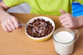 Cereal chocolate balls and glass of milk Royalty Free Stock Photo