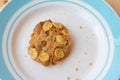 Cereal cookie in plate on wooden table. Crunchy Royalty Free Stock Photo