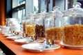 Cereal cornflakes in a glass jar on buffet table Royalty Free Stock Photo