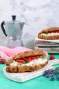 Cereal croissants with cream cheese and fresh strawberries. Useful breakfast. Royalty Free Stock Photo