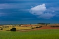 Cereal fields and cloudy sky Royalty Free Stock Photo