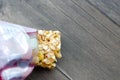 Cereal granola bar. Energy snack on wooden background. Royalty Free Stock Photo