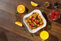 Cereal, morning breakfast, corn flakes, raisins, almonds, mint leaves, orange juice, strawberry, top view, on a dark wooden Royalty Free Stock Photo