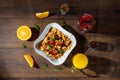 Cereal, morning breakfast, corn flakes, raisins, almonds, mint leaves, orange juice, strawberry, top view, on a dark wooden Royalty Free Stock Photo