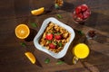 Cereal, morning breakfast, corn flakes, raisins, almonds, mint leaves, orange juice, strawberry, top view, on a dark wooden Royalty Free Stock Photo