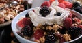 Cereals with berries, dry fruits and whipped cream Royalty Free Stock Photo