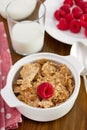 Cereals in the bowl, raspberries