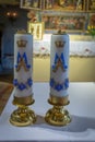 Klepsk, Poland - May 7, 2019: Ceremonial candles on the altar in the Evangelical Church of the Blessed Virgin Mary. The church was