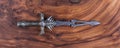 ceremonial dagger on wooden Royalty Free Stock Photo