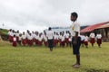 ceremonial leader of school children, location in the mountains of central Papua, Indonesia