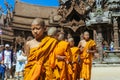 Ceremonial Procession of the Young Monks in the traditional Orange Dressing in the Sanctuary of Truth