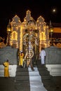 The Ceremonial Tusker exits the Temple pof the Sacred Tooth Relic in Kandy in Sri Lanka during the Esala Perahera. Royalty Free Stock Photo