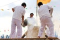 The ceremony of pouring gold Buddha are use is molten metal is poured into a sand mold aluminum to casting Buddha statue.