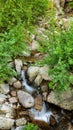 Ceresole Reale, Italy. Small waterfalls between the rocks of a mountain stream, near the Dres waterfall near Lake Ceresole.