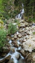 Ceresole Reale, Italy. Small waterfalls between the rocks of a mountain stream, near the Dres waterfall near Lake Ceresole.