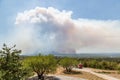 Cerje, Slovenia - July 20th 2022: Huge cloud of smoke from wildfire spreading from Italy to Slovenian villages