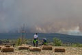 Cerje, Slovenia - July 20th 2022: Tired firefighters watching the wildfire spreading from Italy to Slovenian villages