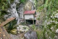 Cerkno, Slovenia - August 25, 2019 : cultural heritage of old partisan hospital Franja hidden in mountains canyons from second wor