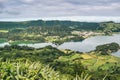 Cerrado das Freiras viewpoint overlooking the famous Sete Cidades Lagoon with cloudy sky, SÃÂ£o Miguel - Azores PORTUGAL Royalty Free Stock Photo