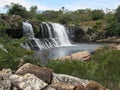 Serra do Cipo, the clear water waterfall forming a beautiful lake in the middle of the undergrowth, stones and