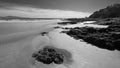 Cerritos Beach rocky granite surf spot in Baja California in Mexico - black and white Royalty Free Stock Photo