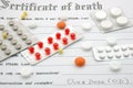Certificate of death and pills. Royalty Free Stock Photo
