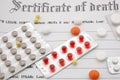 Certificate of death and pills. Royalty Free Stock Photo