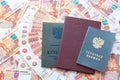 A certificate, a red diploma and a work book are on the five thousandth Russian rubles Royalty Free Stock Photo
