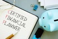 Certified Financial Planner CFP is shown using the text Royalty Free Stock Photo