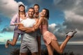 Certified group exercise instructor and his team. Premium high resolution photo Smiling women and man fitness team. A Royalty Free Stock Photo