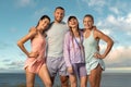 Certified instructor and his team of trainees. Download high resolution photo smiling women and man fitness team. A Royalty Free Stock Photo