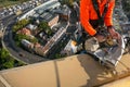 Certifies rope access high rise worker licences using yellow ascender descending with low stretch abseiling rope over the edge