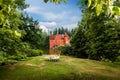 Cervena Lhota - the red, water chateau in the the Czech republic. Royalty Free Stock Photo
