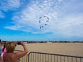 Performance of four-wire acrobatic kites revolution by the sea o