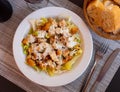 Cesar salad with chicken, lettuce and cheese parmesan