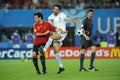 Cesc Fabregas and Gianluca Zambrotta in action during the match Royalty Free Stock Photo