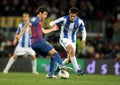 Cesc Fabregas(L) vies with (R) Markel Bergara(R)