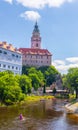 Cesky Krumlov castle tower on the rock above the river Vltava, in summer, Czech republic Royalty Free Stock Photo