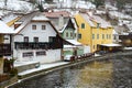 Hotels and restaurants on bank of Vltava River in historic center of small medieval town of Czech Krumlov, Czech Republic