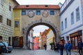 Cesky Krumlov, Czech Republic; 5/18/2019: Latran houses and medieval arch in Latran Street Royalty Free Stock Photo