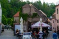 Cesky Krumlov, Czech Republic; 5/18/2019: Restaurant in the old town of Cesky Krumlov within an antique house with a terrace and a Royalty Free Stock Photo