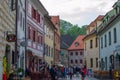 Cesky Krumlov, Czech Republic; 5/18/2019: Street in the old town of Cesky Krumlov with restaurants and typical colorful czech Royalty Free Stock Photo