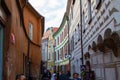 Cesky Krumlov, Czech Republic; 5/18/2019: Street in the old town of Cesky Krumlov with restaurants and typical colorful czech Royalty Free Stock Photo